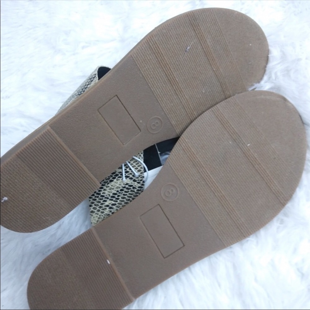 Black and snake skin sandals